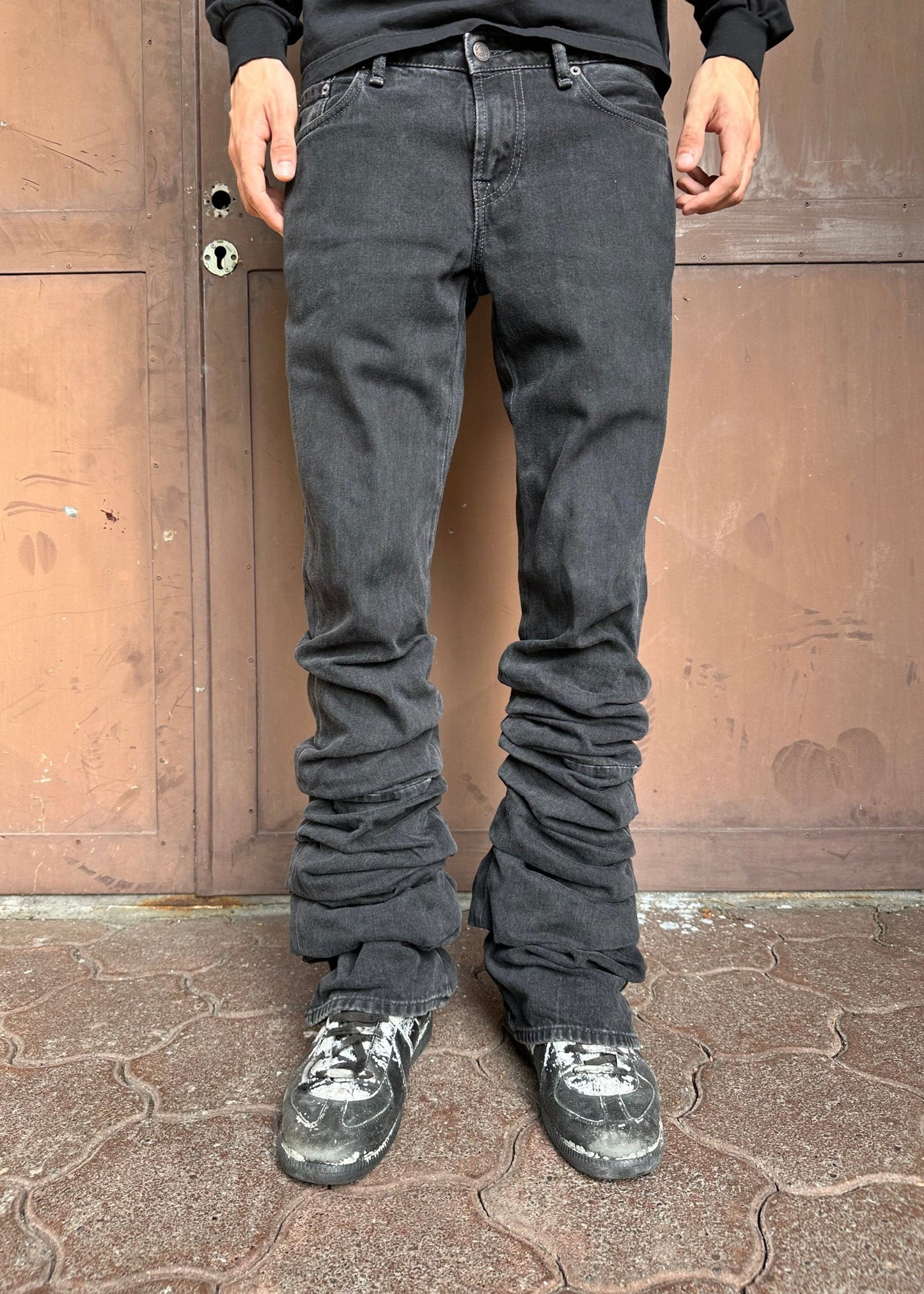 Acne Studios Ruched low-rise flared coated-denim jeans